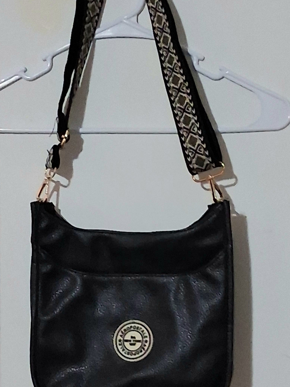 Black Crossbody Bag with Patterned Strap